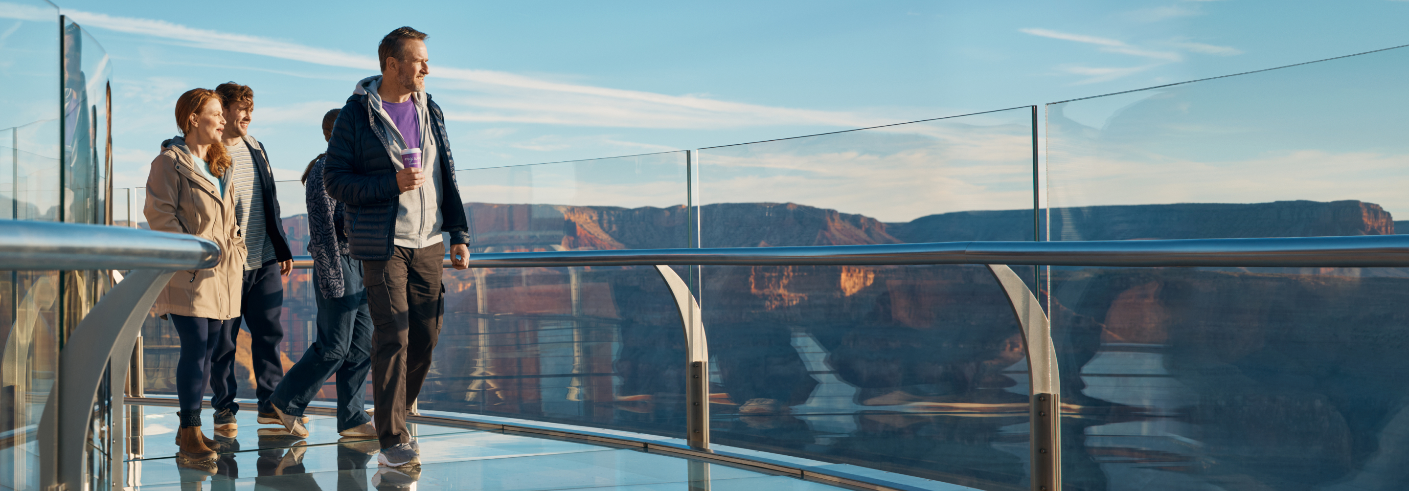 A family hikes at the grand canyon 
