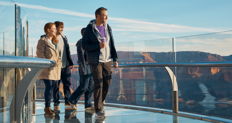 A family hikes at the grand canyon 