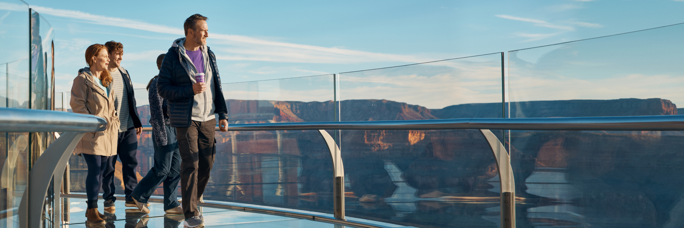 A family hikes at the grand canyon 
