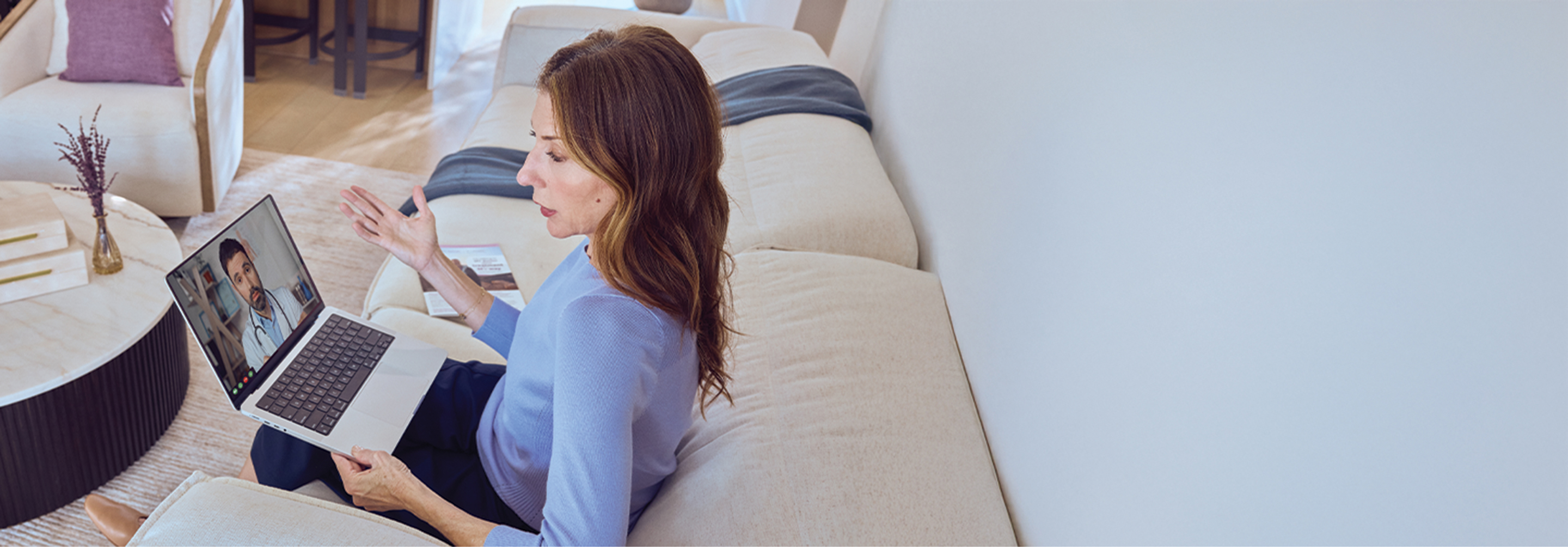  Tennis legend Monica Seles talks with her doctor in a telehealth call.