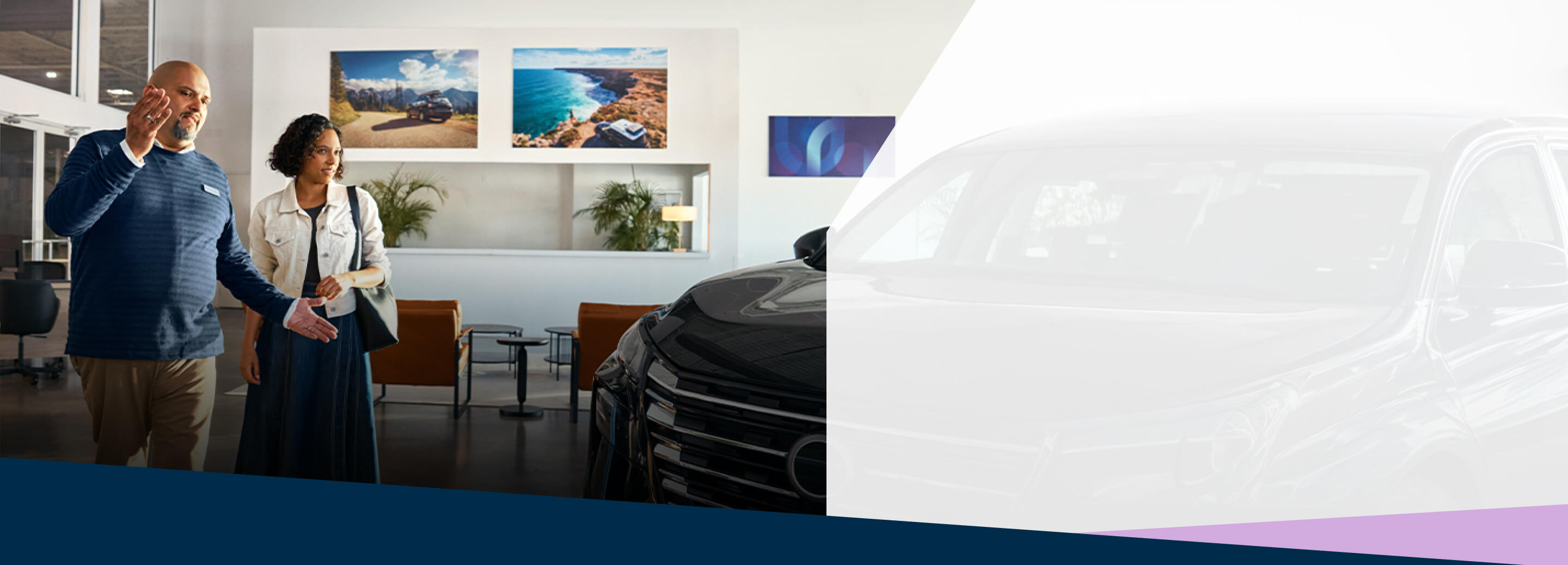 Fred shows a client around the car showroom where he works.