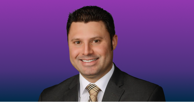 Headshot of Neurologist Jon Durrani against a purple background.