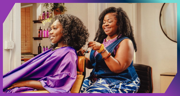 Lanica styling a client’s hair at her salon