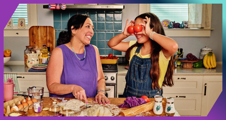 Liz and her granddaughter cooking in the kitchen