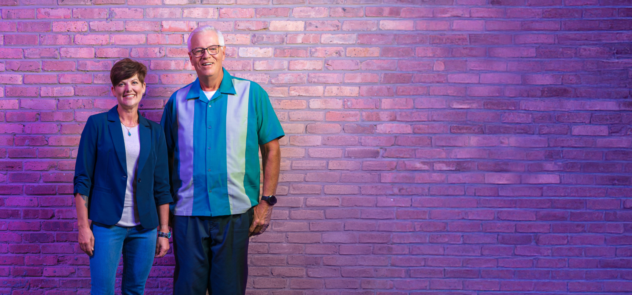 Lynn and Patrick standing and smiling together