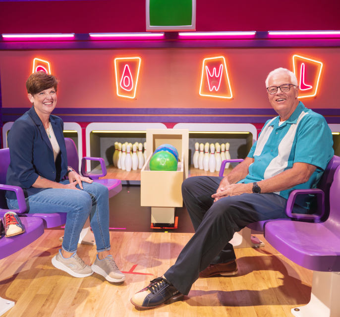 Lynn and Patrick on the bowling set